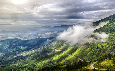 aerial view of mountain slope covered in smoke thumbnail