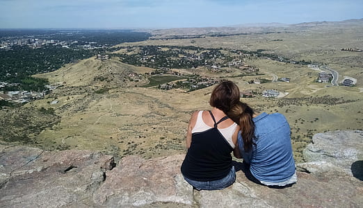 man and woman on hill during daytime thumbnail