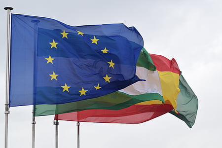 four flags on poles thumbnail