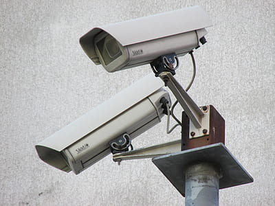 two white bullet security cameras thumbnail