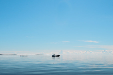 boat of body of water during daytime thumbnail