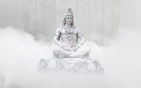 Hindu Deity statue surrounded by fogs thumbnail