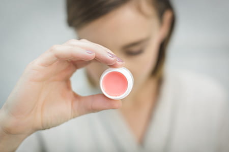 woman holding round case thumbnail