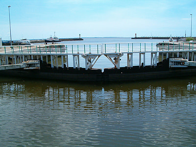 Gates to Port Saint-Nazaire towards the Loire River in Saint-Nazaire, France thumbnail
