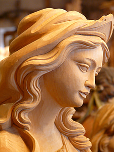 wood carving of women thumbnail