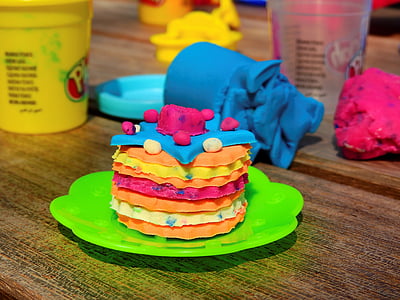 pile of clay cake on green plate thumbnail
