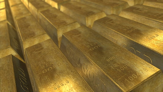closeup photo pile of gold bars thumbnail