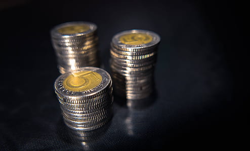 silver and brown round coins thumbnail
