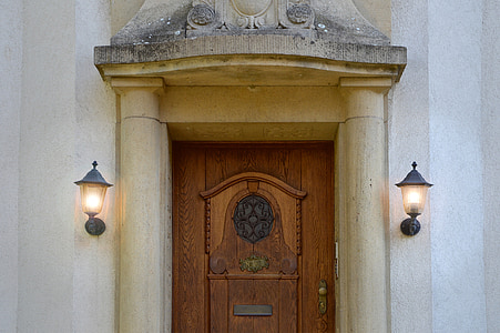 closed brown wooden door thumbnail