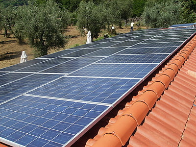 blue solar panels on roof thumbnail