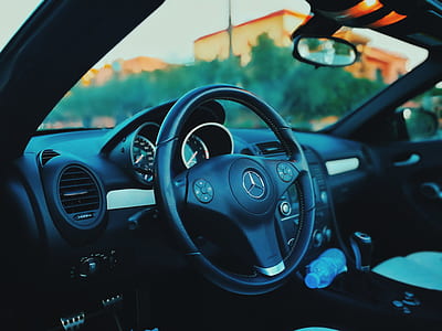 black Mercedes-Benz car steering wheel thumbnail