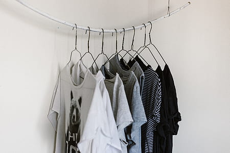 t-shirts hanged on white rope thumbnail