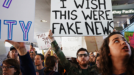 People Rallying holding posters thumbnail
