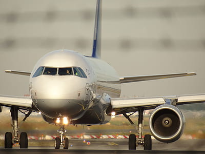 selective focus photography of airplane thumbnail