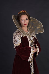 woman wearing red and brown floral top thumbnail