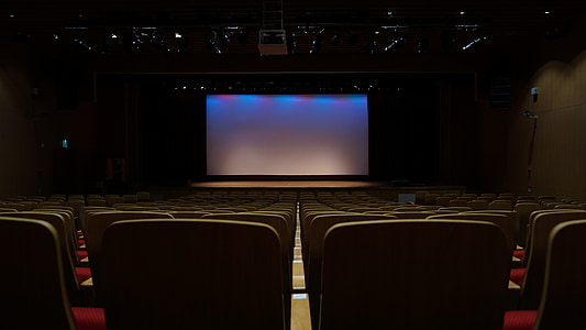 closeup photo of screen near chairs thumbnail