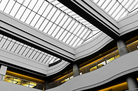 gray concrete building with glass roof thumbnail