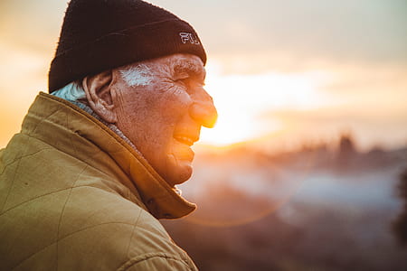 close-up photo of man in coat thumbnail