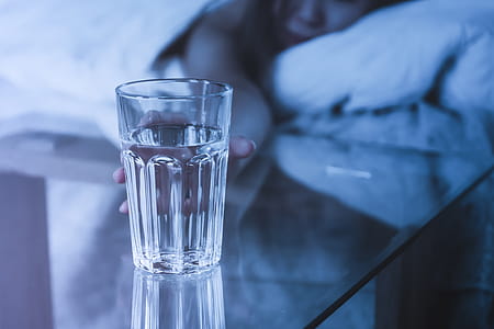 Close up Woman the Woman is thirsty and wants to drink at night thumbnail