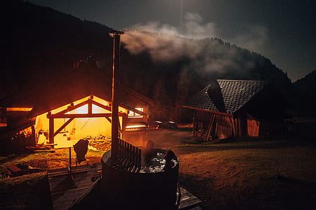 two people in hot tub photo during nighttime thumbnail