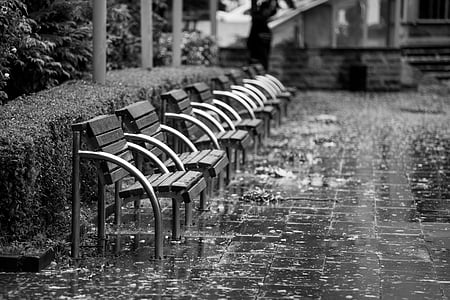 grayscale photography of gray wooden armchairs thumbnail