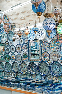 assorted pendant lamps near decorative plates thumbnail