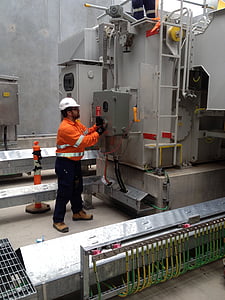 man touching industrial machine thumbnail