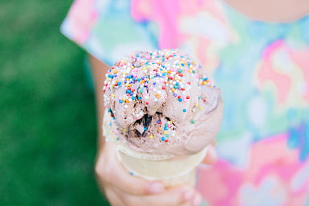 chocolate ice cream with sprinkles shallow focus photography thumbnail
