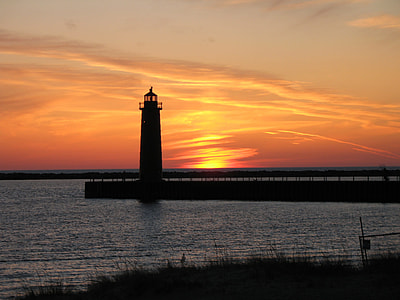 silhouette of lighthouse during susnet thumbnail