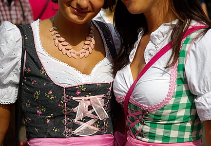 two women taking a photo thumbnail
