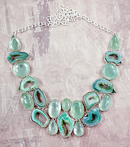 silver-colored necklace with teal gemstones thumbnail