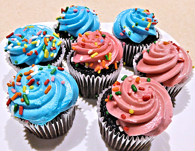 seven cupcakes with sprinkles on plate thumbnail
