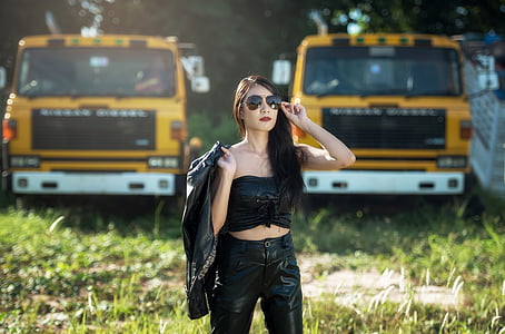 woman wearing black latex crop top and leggings thumbnail