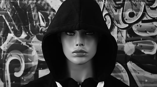 greyscale photo of woman wearing black hooded top thumbnail