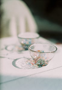 two clear glass cups thumbnail