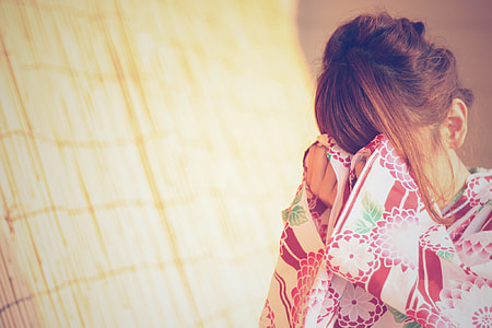 woman in pink floral traditional dress focus photo thumbnail