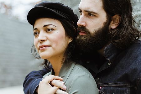 man hugging woman during daytime thumbnail