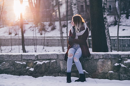 woman sitting beside tree thumbnail