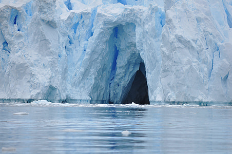 ice cave surrounded with water thumbnail