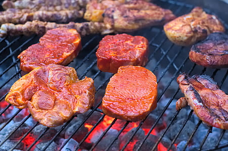 meat being grilled on grill thumbnail