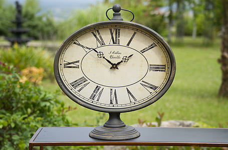 analog desk clock at 1:51 thumbnail