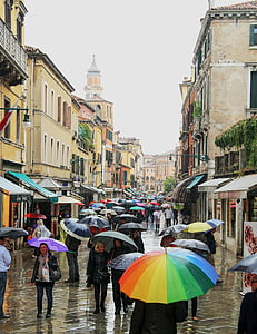 people holding umbrella thumbnail