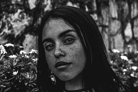 grayscale photo of woman with earrings thumbnail