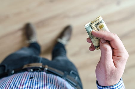 Person Holding Banknote thumbnail