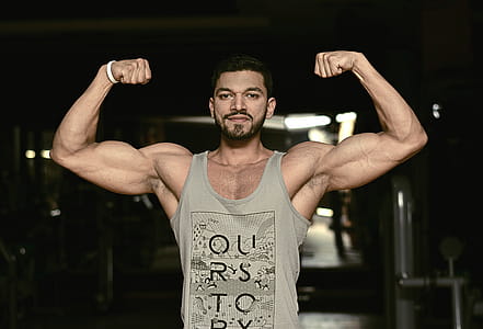 Man Wearing Gray Tank Top thumbnail