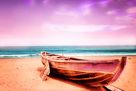 brown canoe on seashore thumbnail