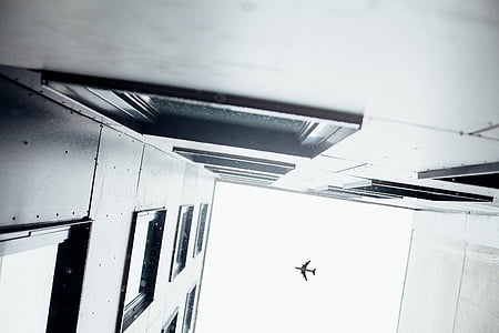 gray airplane on sky thumbnail