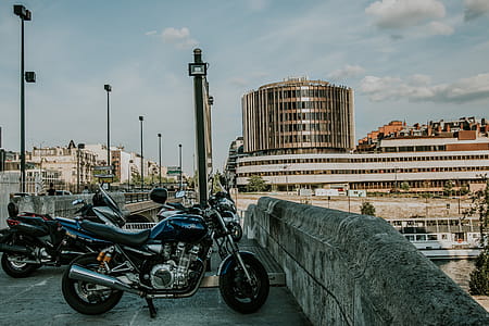 Parked Motorcycle on Gray Concrete Floor thumbnail