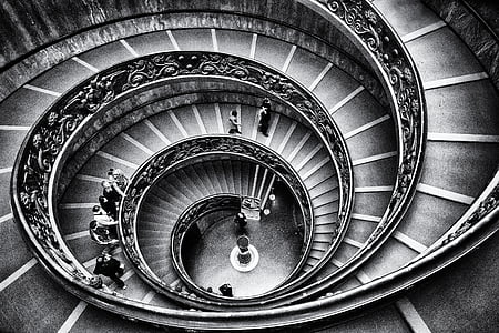 grayscale photography of spiral staircase thumbnail