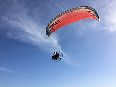 person with red and white paracute thumbnail